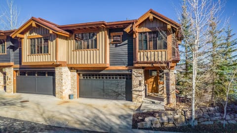 Home is on the right with connected garage. 