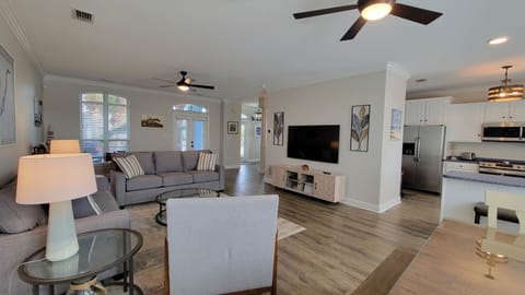 From the dining area, you can socialize with others throughout the first floor