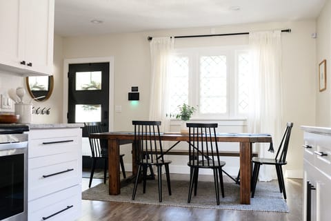 Dining room table off the kitchen. Seats 8-12. Highchair provided.