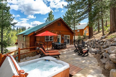 Back patio with hot tub: Mountain Relaxation Haven