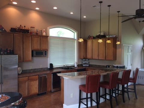 Upstairs game room party kitchen 