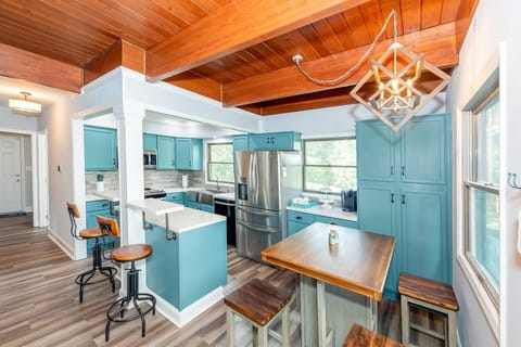 The eat-in kitchen provides a table for four with additional seating at the island