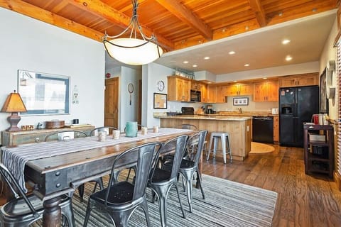View of the dining area and fully-equipped kitchen