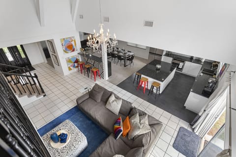 aerial view of living room, kitchen and dining room