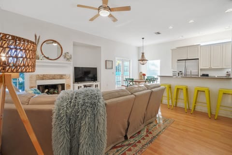 Leather sectional couch with powered end recliners. 