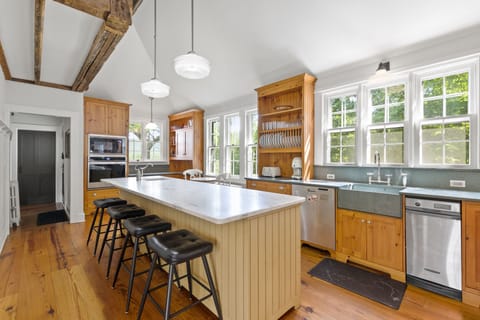 kitchen also has large refrigerator and trash compactor