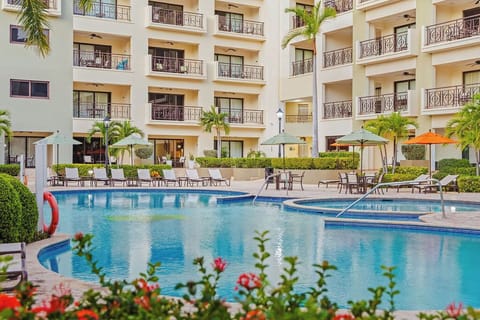 swimming pool with ample space for cooling off, lounging, and enjoying the Aruba sunshine.