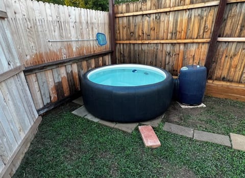 Relax in the Softub Legend® 220.  Accommodates up to 4 adults. 