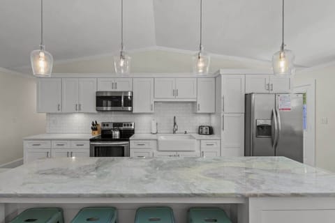 This gourmet kitchen is a chef's dream, complete with top-of-the-line appliances.