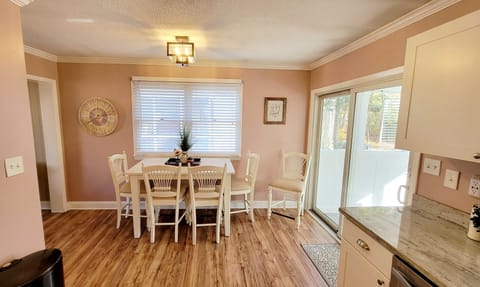 Extra leaf for table to extend to seat 6 for family game nights in laundry area