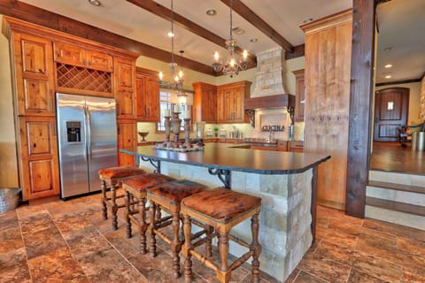 The kitchen features bar seating.