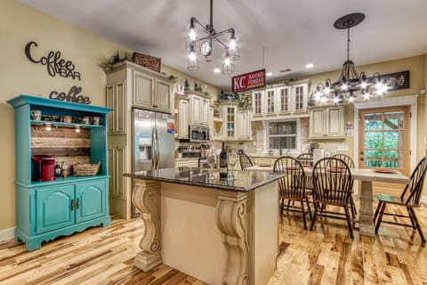 Kitchen with coffee bar, waffle maker, toaster, blender and more
