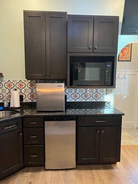 Extra storage for groceries while you’re here - and a microwave. 