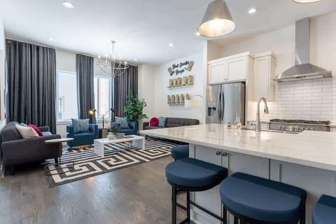 Free-flowing kitchen and living space for continuous chats.