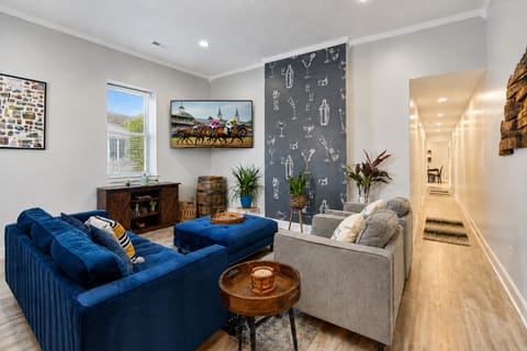 Have a drink or watch the 4K Roku TV in our spacious living room.