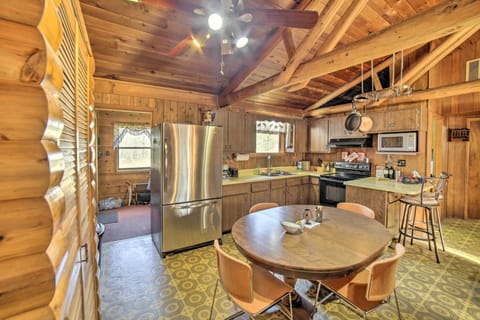 Kitchen & Dining Area | 2-Person Breakfast Bar | Crock-Pot | Spices