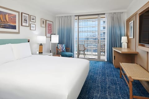 Lounge by the window, then step out to the balcony.