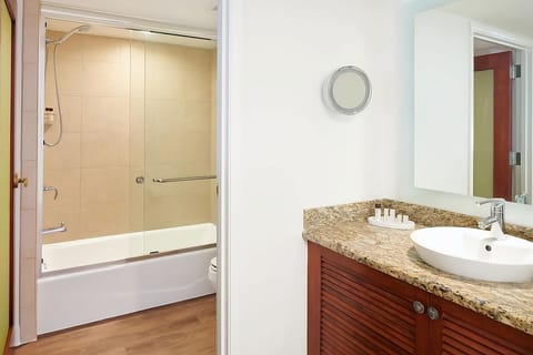 Refresh easily with bright vanity space and deep soaking tub.