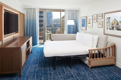 Wake up to city views and lounge by the sunlit balcony.