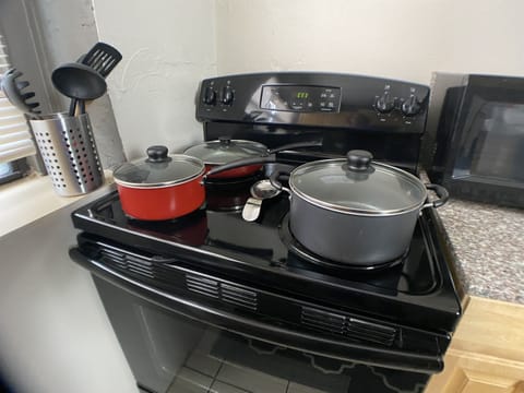 Pots & pans provided for cooking.