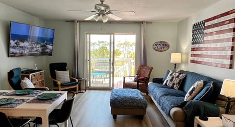 Comfortable living-dining area opens onto private deck