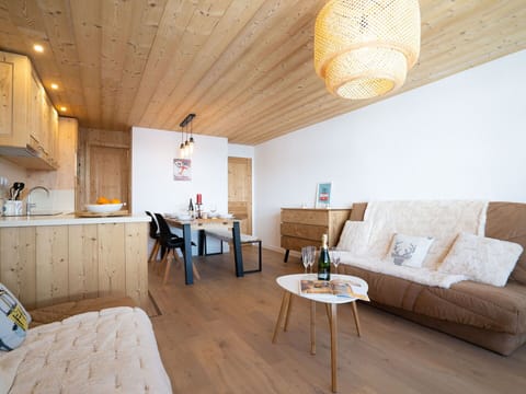 Furniture, Table, Property, Wood, Lighting, Interior Design, Comfort, Architecture, Yellow, Flooring