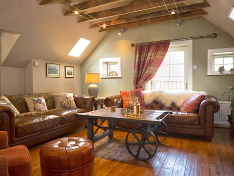 The living room at The Maltings, self catering lodge in Nethy Bridge