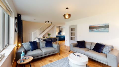 Living room and open plan dining space