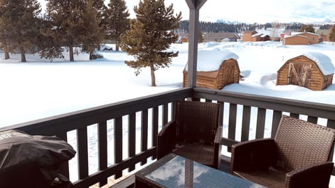Balcony w/ patio furniture & BBQ grill