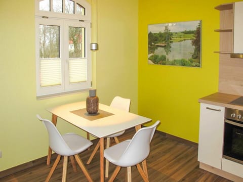 Table, Furniture, Property, Chair, Green, Cabinetry, Building, Interior Design, Picture Frame, Wood