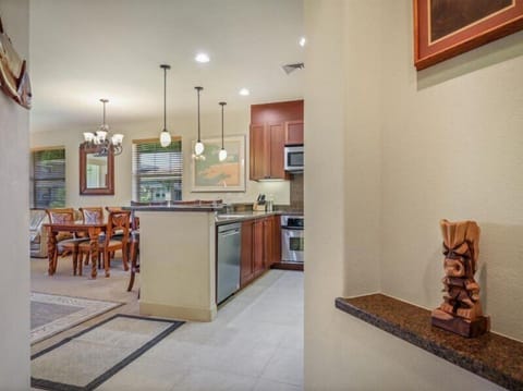 Décor in the unit has original wall artwork along with sculptures and wood carvings