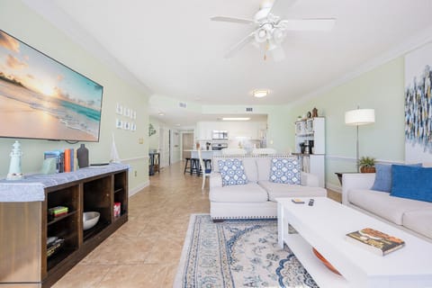 Relax on the comfortable sofa, enjoying the coastal decor and a large TV for your entertainment