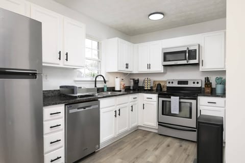 Here is our fully stocked kitchen, equipped with all the things you need to prepare great home cooked meals.