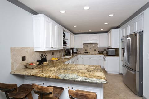 Stunning kitchen with everything you need to make the perfect meal. High Top (3 Seating)