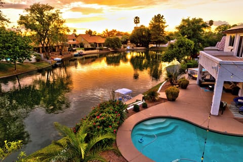 Beautiful sunset photo overlooking pool and lake