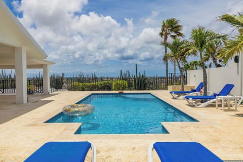 A spacious private pool, perfect for a refreshing start or a sunset dip.