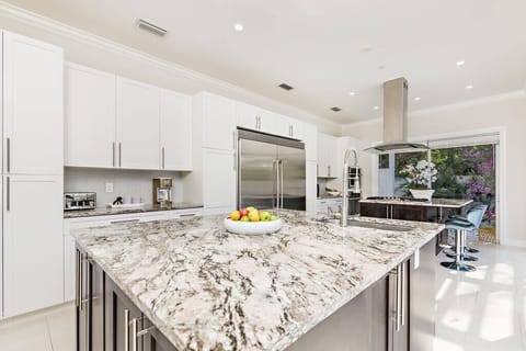 Modern fully stocked kitchen with brand new stainless appliances