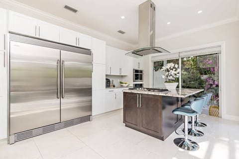 Gorgeous fully stocked kitchen with brand new stainless steel appliances