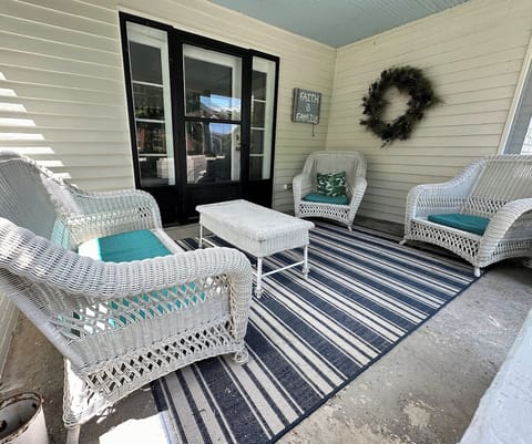Great front porch to sit on in the evening and watch the world pass by.