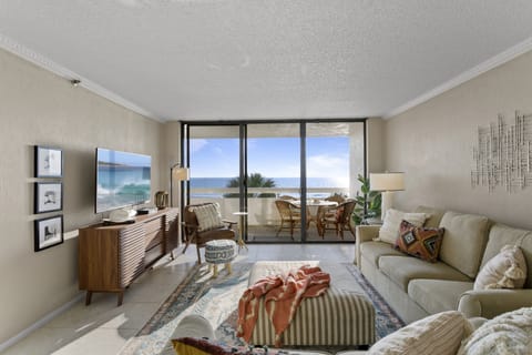Main living area with balcony and Gulf front, ocean views with stunning sunsets