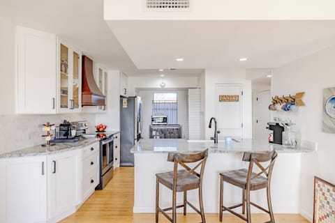 Bar seating into the kitchen