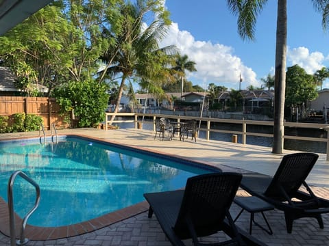 Enjoy the heated pool with the waterfront calming view.