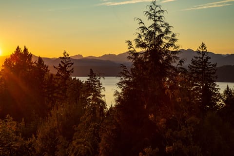 Summer sunsets from every window in the guest house.