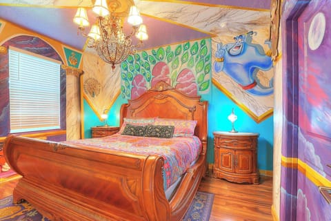 Bedroom 2: Main Level: Welcome to Agraba. Experience the luxurious Princess Jasmine's king-size suite with a Stearns & Foster mattress. This romantic suite features a smart TV, two nightstands, a dresser, and an en-suite bathroom.
