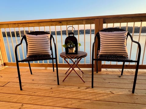 New covered deck with plenty of seating, grill & fan