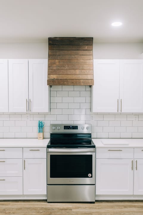 Oven with beautiful range made of repurposed wood from the house