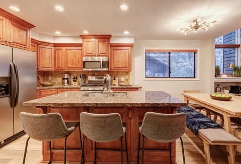 Gourmet Kitchen: Cook up a storm in a spacious kitchen with sleek granite and modern amenities!