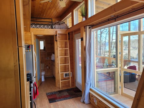 Second queen bunk over the full bathroom.