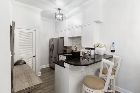 Kitchen area with bar seating