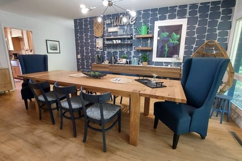 Dining table offers seating for up to 12 with additional bench.